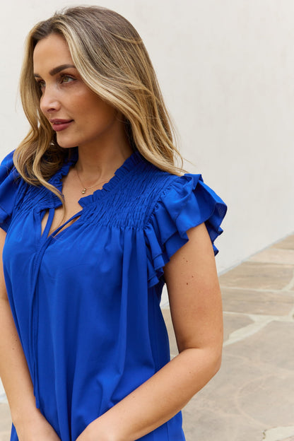 And the Why Ruffle Sleeve Smocked Detail Mini Dress: Elevate Your Style with Elegance